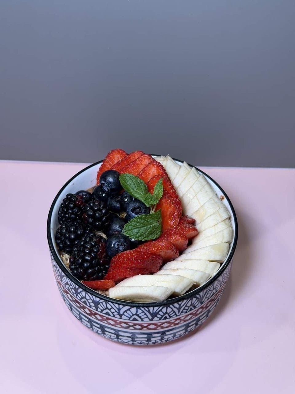 An açaí bowl with granola and fresh fruit at Toasted Cafe in Montrose