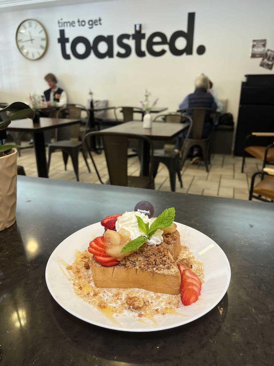 Apple Pie at Toasted Cafe in Montrose — Warm apples and nutmeg on thick-cut toast, then strawberries, caramel, honey and whip cream over the top.