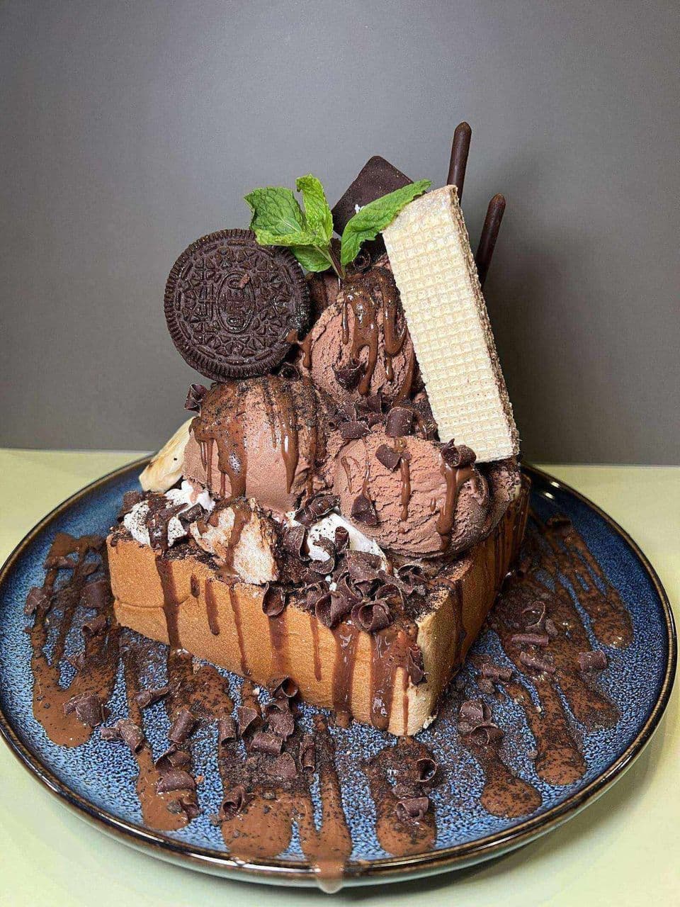 Chocoholic at Toasted Cafe in Montrose — Chocolate ice cream, oreos, chocolate curls, banana, marshmallow, honey, whip cream.