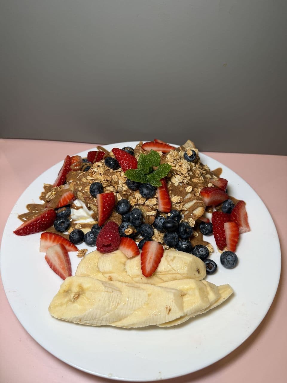 Simply Toasted at Toasted Cafe in Montrose — Vanilla yogurt, granola and almond butter with a seasonal fruit medley and honey.