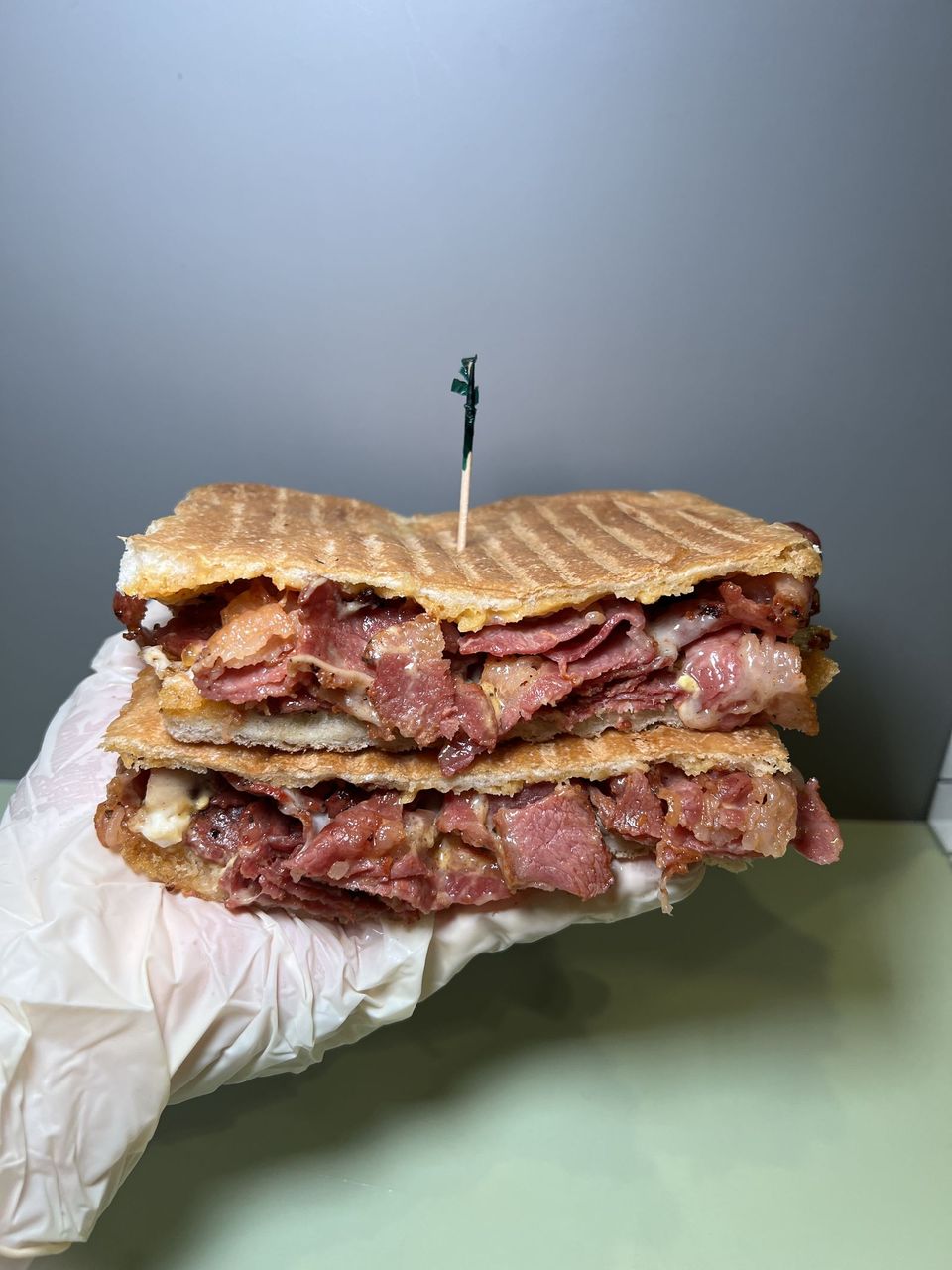 Breakfast Pastrami at Toasted Cafe in Montrose — Egg, pastrami, mayo, thousand island, Monterey jack.