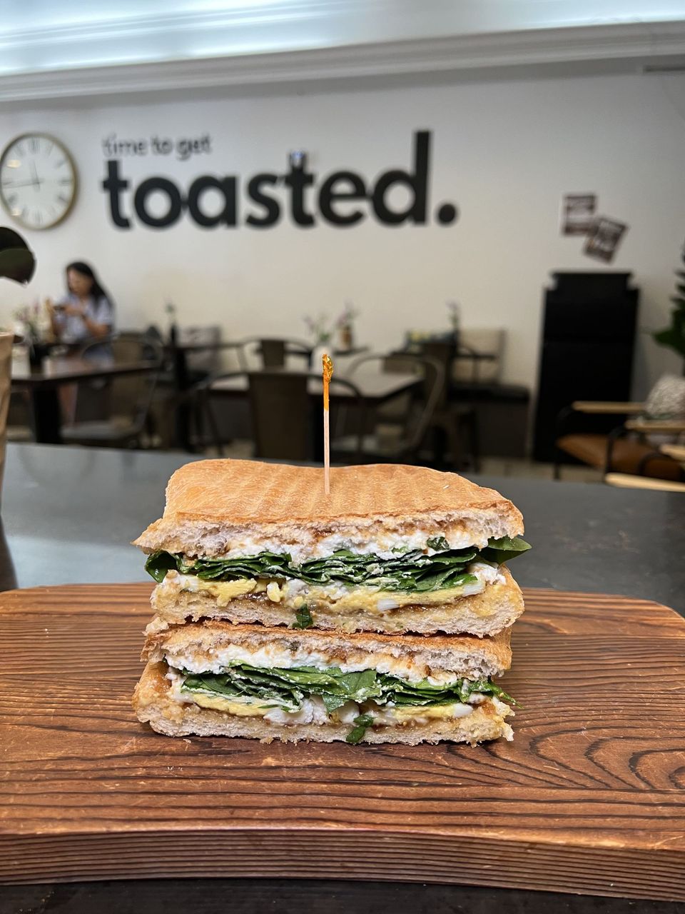 Goat Cheese & Fig at Toasted Cafe in Montrose — Egg, fig spread, goat cheese, basil & spinach with a touch of lemon.