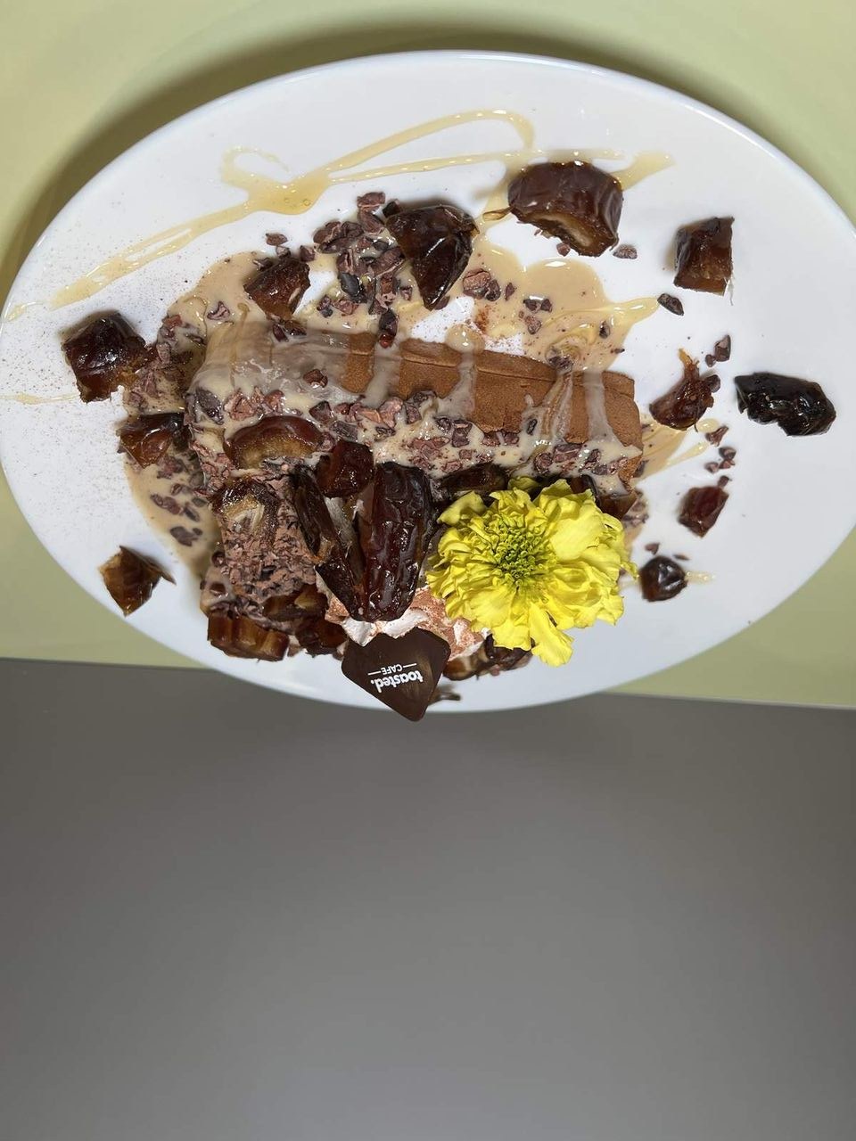 Tahini, Dates & Dark Cacao at Toasted Cafe in Montrose — Tahini, dates, cacao nibs, cocoa, whip cream, honey.